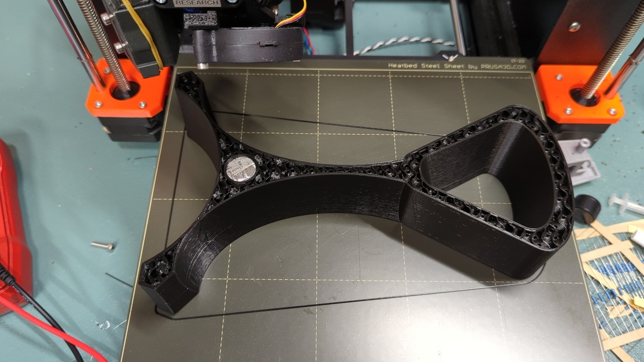 Headphone stand paused mid-print with the steel weight inserted