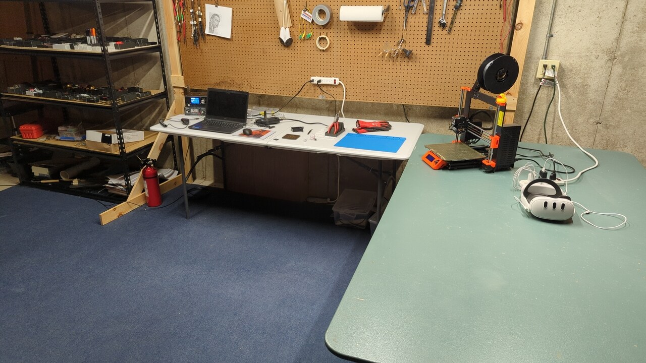The same lab space with most of the clutter removed; new shelves are visible on the left