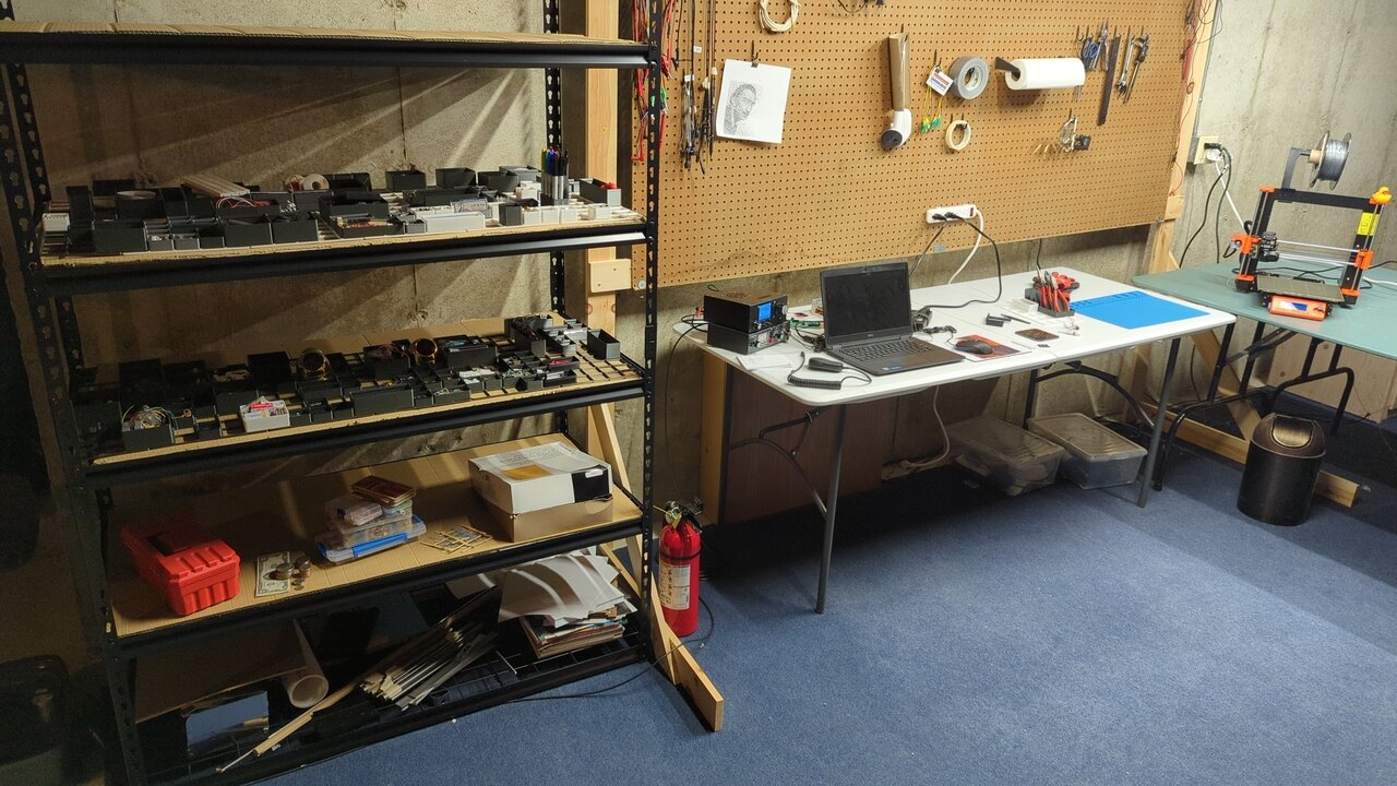 A better view of the shelves; five levels with cardboard sheets